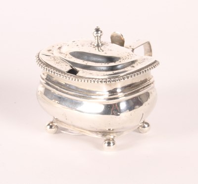 Lot 147 - A George III silver mustard pot and spoon,...