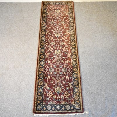 Lot 38 - A Persian woollen runner, all over floral...