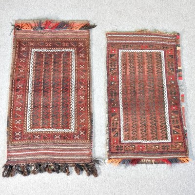 Lot 398 - A Persian saddle bag, together with another (2)