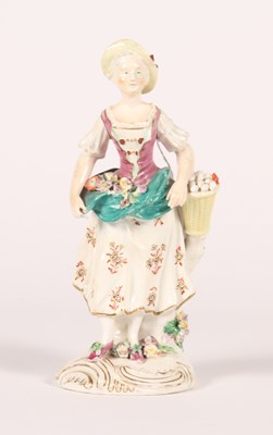 Lot 92 - A Chelsea porcelain figure of a lady, mid-18th...