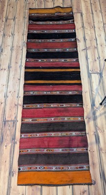 Lot 530 - A Turkish flatweave kilim runner, with...