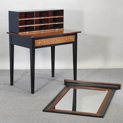 Lot 639 - A reproduction French style fruit wood and black painted desk
