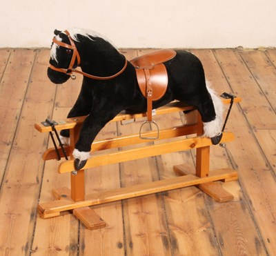 Lot 509 - A child's rocking horse, mounted upon a pine...