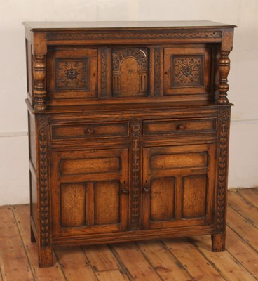 Lot 310 - An oak court cupboard, 20th century, ornately...