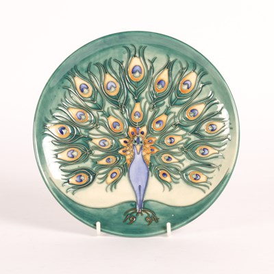 Lot 334 - A Moorcroft Peacock pattern plate, dated 1994,...