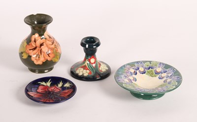 Lot 206 - A collection of four pieces of Moorcroft...