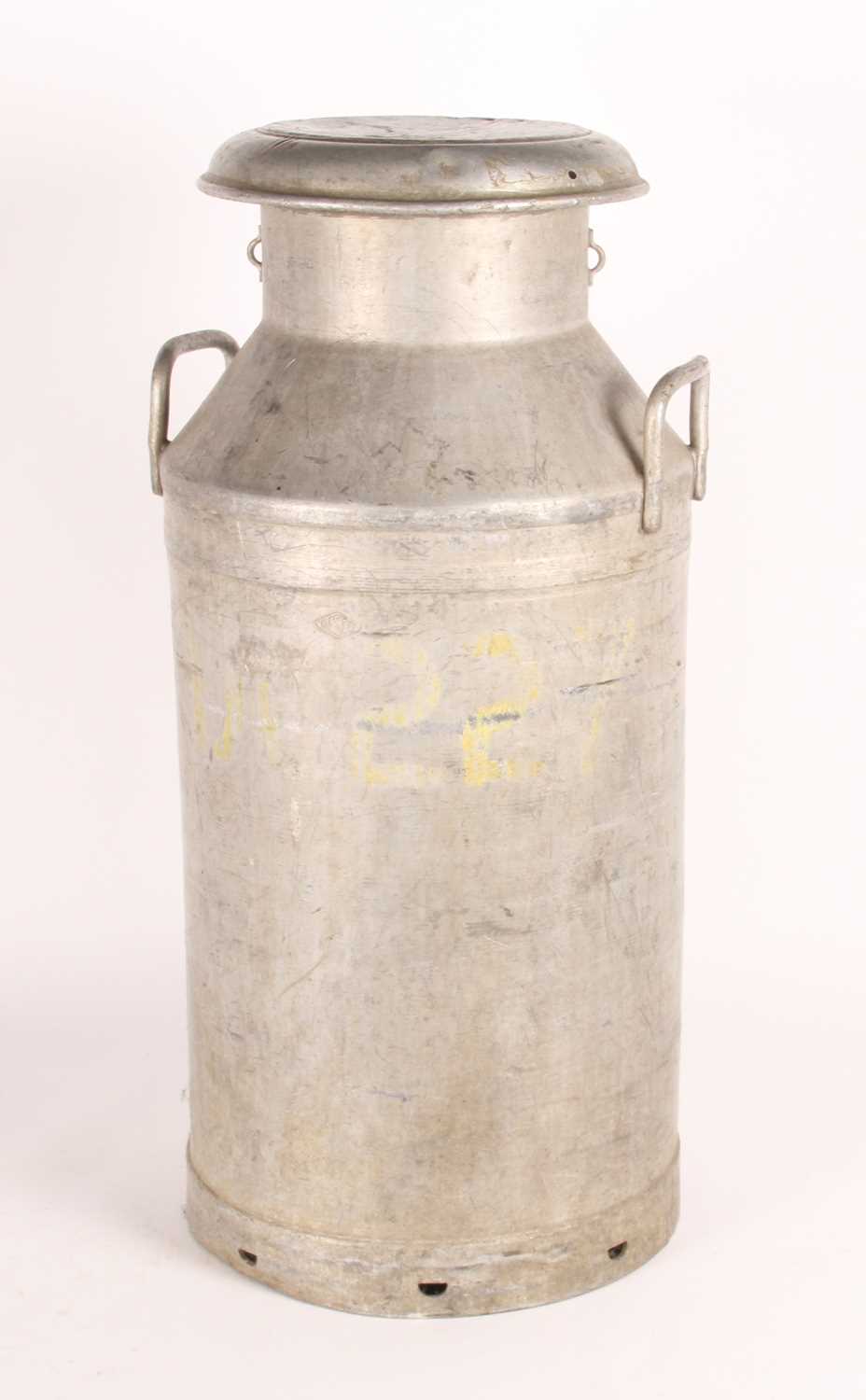 Lot 82 - A large metal milk churn, inscribed...