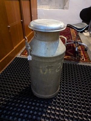 Lot 82 - A large metal milk churn, inscribed...