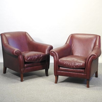 Lot 530 - A pair of modern oxblood leather upholstered armchairs