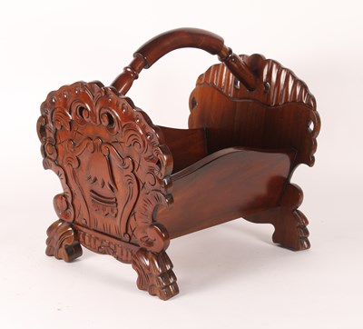 Lot 268 - A carved mahogany log basket, w.49cm