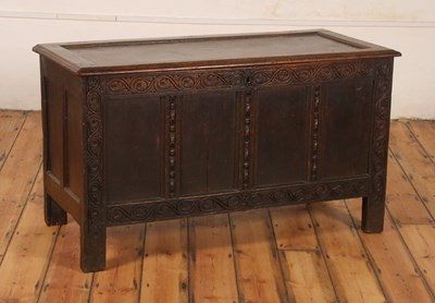 Lot 314 - An oak coffer, 18th century, having a carved...