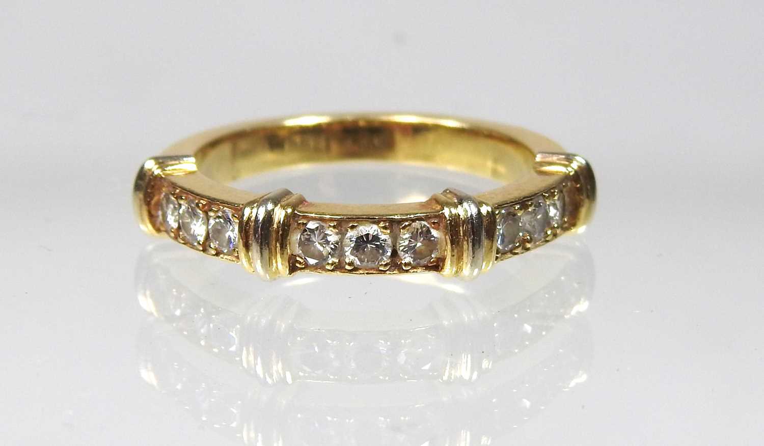 Lot 248 - A Cartier 18 carat nine stone Contessa diamond...