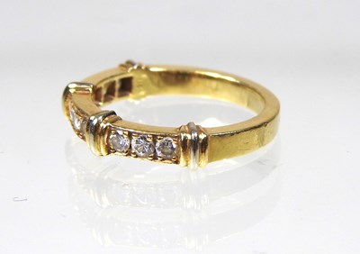 Lot 248 - A Cartier 18 carat nine stone Contessa diamond...