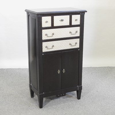 Lot 514 - A modern black and white narrow cabinet