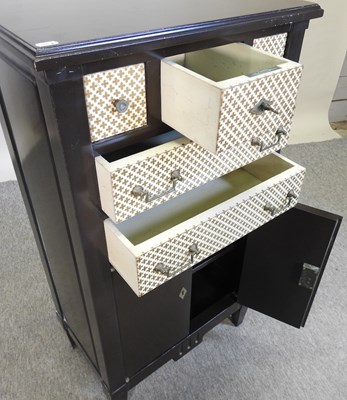 Lot 514 - A modern black and white narrow cabinet