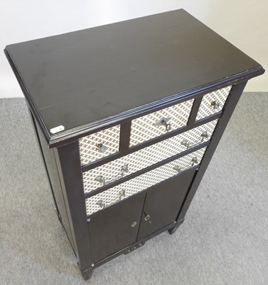 Lot 514 - A modern black and white narrow cabinet