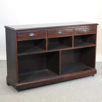 Lot 687 - A modern hardwood dwarf open bookcase