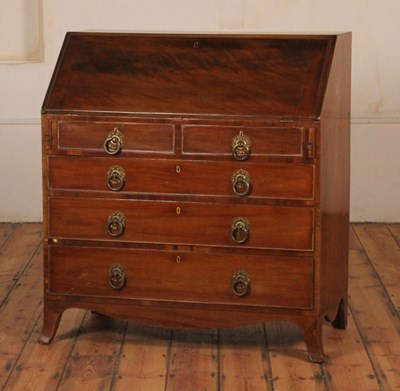 Lot 383 - A Regency mahogany bureau, on swept bracket...