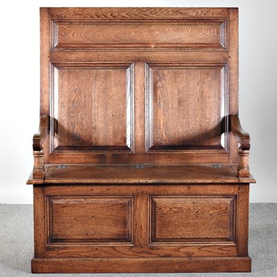 Lot 285 - An 18th century style oak settle, 20th century,...