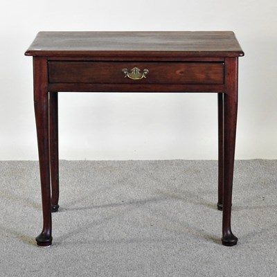 Lot 557 - An 18th century mahogany side table, with a...