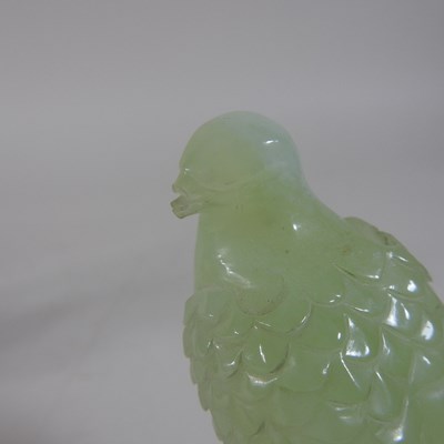 Lot 146 - A pair of oriental carved jade coloured stone birds