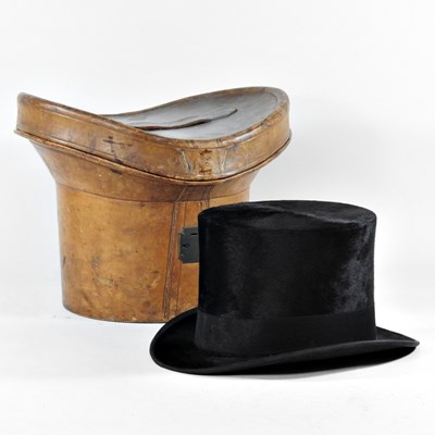 Lot 62 - An early 20th century black fur top hat, 20 x...