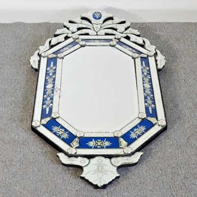 Lot 517 - An ornate Venetian wall mirror, of octagonal...