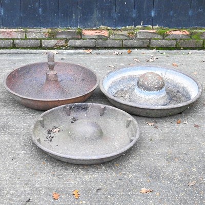 Lot 344 - A cast iron pig trough, 65cm diameter,...