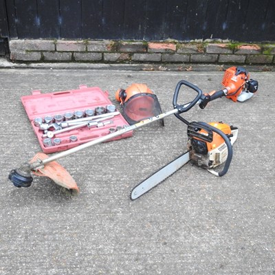 Lot 207 - A petrol chainsaw, together with a socket set,...