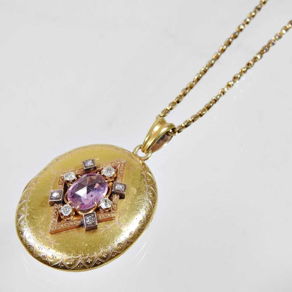 Lot 76 - A Victorian diamond and gem set gilt locket,...