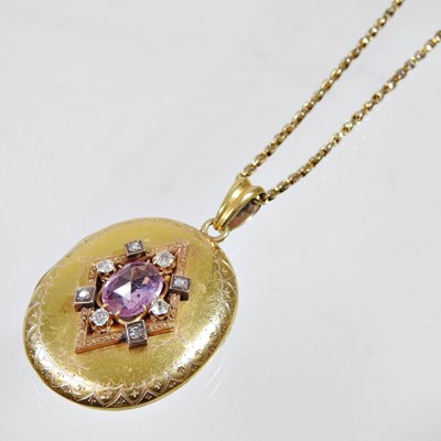 Lot 76 - A Victorian diamond and gem set gilt locket,...