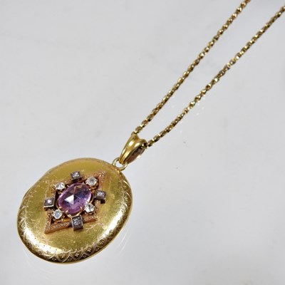 Lot 76 - A Victorian diamond and gem set gilt locket,...