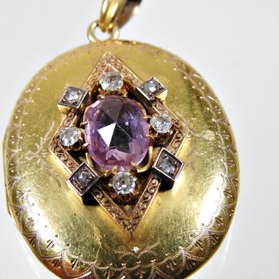 Lot 76 - A Victorian diamond and gem set gilt locket,...