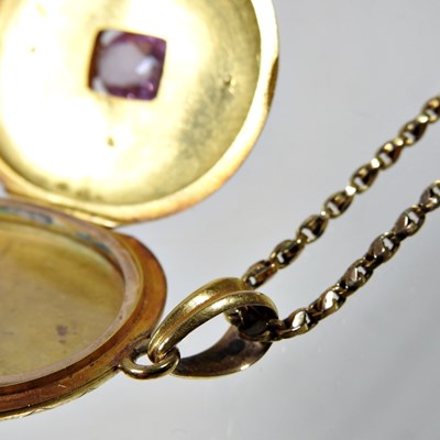 Lot 76 - A Victorian diamond and gem set gilt locket,...