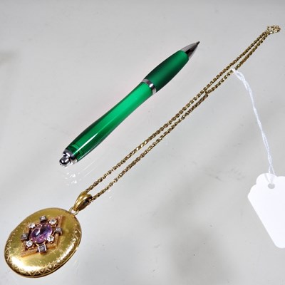Lot 76 - A Victorian diamond and gem set gilt locket,...