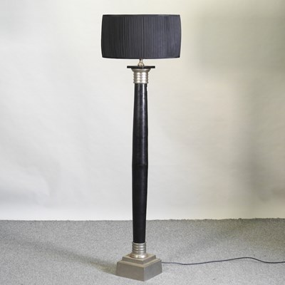 Lot 518 - A modern black painted standard lamp and shade