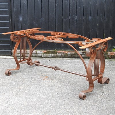 Lot 323 - A wrought iron table base