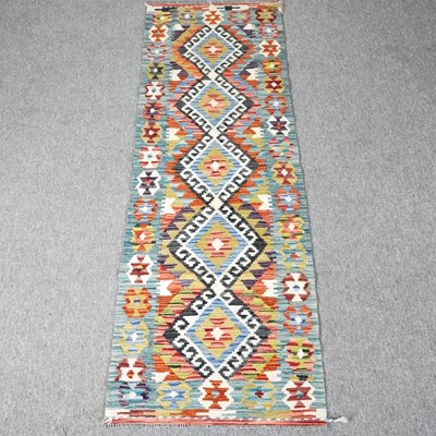 Lot 212 - A kilim runner, with five hooked diamonds, 207...