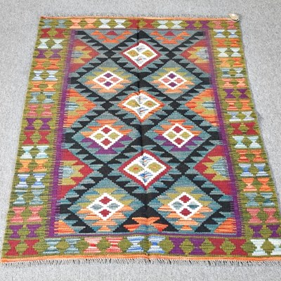 Lot 39 - A kilim rug, with coloured lozenges, 147 x 100cm