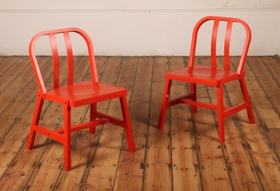 Lot 440 - A set of five red painted Saw dining chairs,...