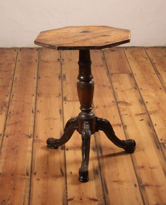 Lot 354 - A carved oak tripod occasional table, 19th...