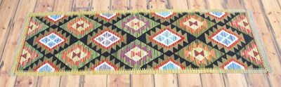 Lot 301 - An Afghan Maimana kilim runner, decorated with...