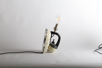 Lot 412 - An unusual table lamp, converted from a...