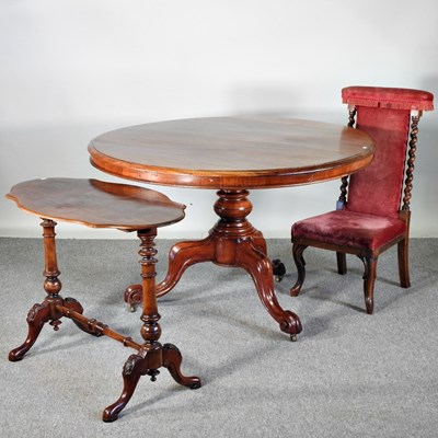 Lot 350 - A Victorian circular dining table, together...