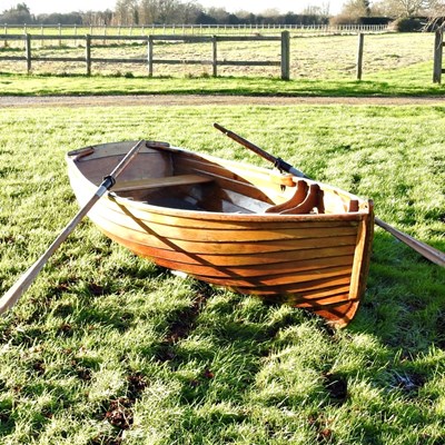 Lot 100 - A recently restored traditional wooden rowing...