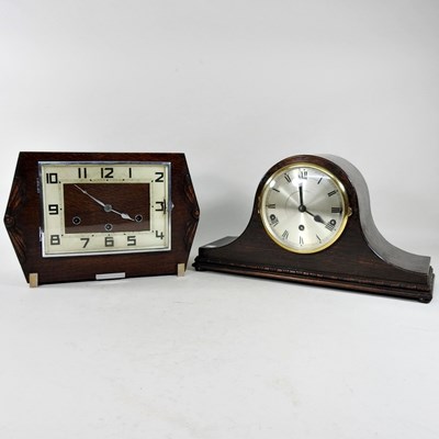 Lot 335 - An Art Deco oak mantel clock, 24cm high,...