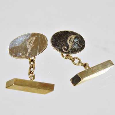 Lot 105 - A pair of 9 carat gold cufflinks, each of oval...