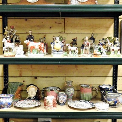 Lot 545 - A collection of Staffordshire style pottery...