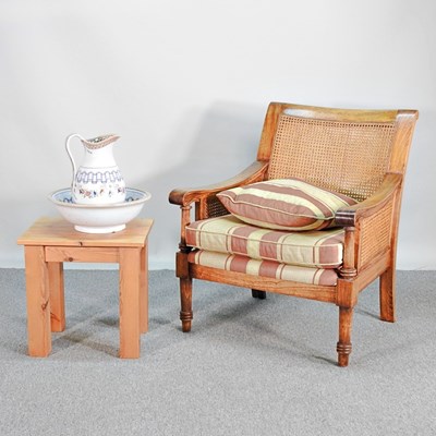 Lot 535 - A hardwood cane bergere armchair, together...