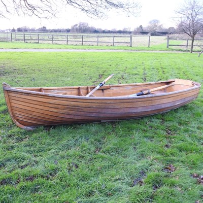 Lot 2 - A large traditional wooden rowing boat, of...